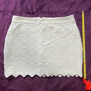 Feminine and Flirty Skirt. Excellent condition! Zip up back. Slip attached.